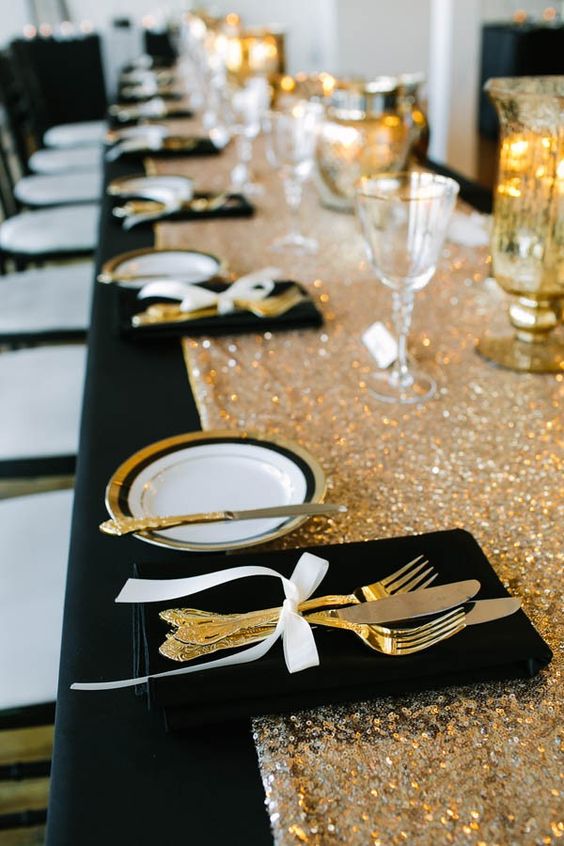 Black, white and gold party with glitter gold bottle centerpieces